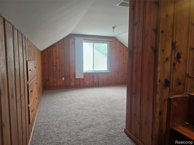 29263 Barton St, Garden City, MI 48135 - additional living space with vaulted ceiling, carpet floors, and wooden walls