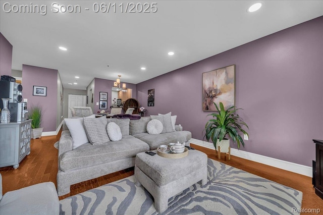 1001 W Jefferson Ave Unit 2I, Detroit, MI 48226 - living room with baseboards, wood finished floors, recessed lighting, and a chandelier