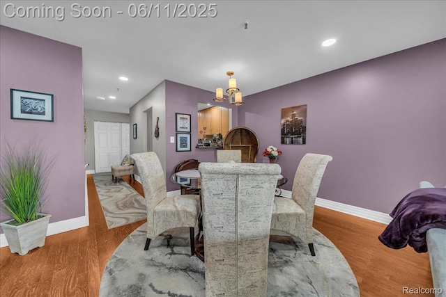 1001 W Jefferson Ave Unit 2I, Detroit, MI 48226 - dining space featuring baseboards, wood finished floors, a chandelier, and recessed lighting