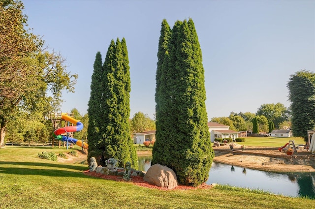 5379 N Irish Rd, Davison, MI 48423 - view of community with a yard and a water view