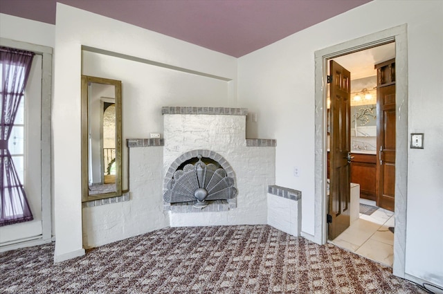 5379 N Irish Rd, Davison, MI 48423 - unfurnished living room featuring a fireplace and carpet flooring