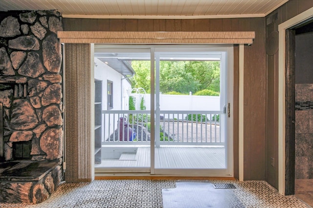5379 N Irish Rd, Davison, MI 48423 - doorway to outside featuring wood walls and wood ceiling