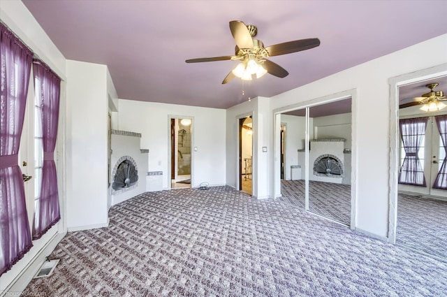 5379 N Irish Rd, Davison, MI 48423 - laundry room featuring carpet floors, ceiling fan, and baseboards