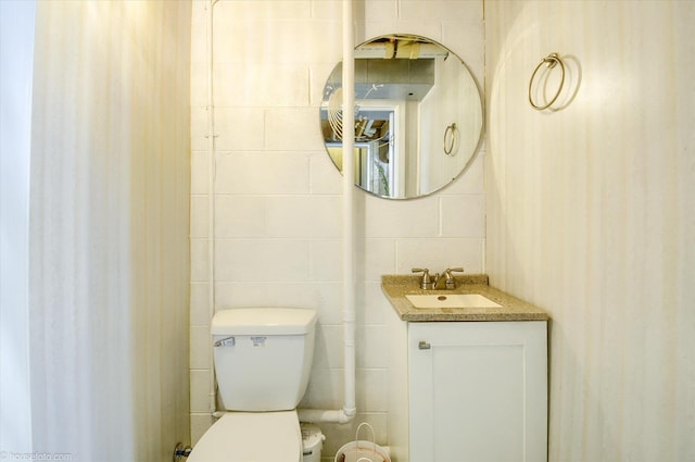 5379 N Irish Rd, Davison, MI 48423 - bathroom featuring vanity and toilet