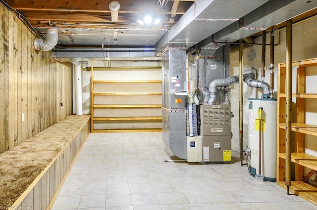 5379 N Irish Rd, Davison, MI 48423 - unfinished basement featuring water heater, heating unit, and wooden walls