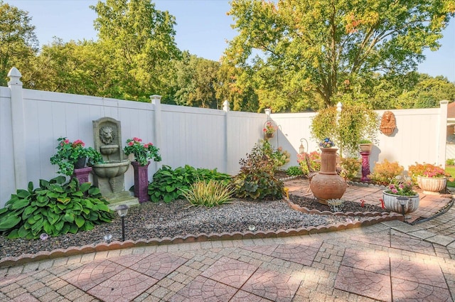 5379 N Irish Rd, Davison, MI 48423 - fenced backyard with a patio area