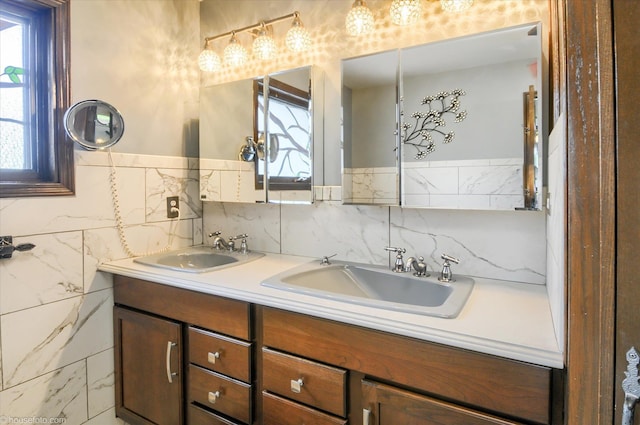 5379 N Irish Rd, Davison, MI 48423 - bathroom with double vanity, healthy amount of natural light, and tile walls