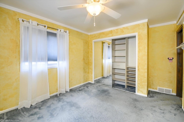 5379 N Irish Rd, Davison, MI 48423 - unfurnished bedroom with carpet, ornamental molding, ceiling fan, baseboards, and a closet
