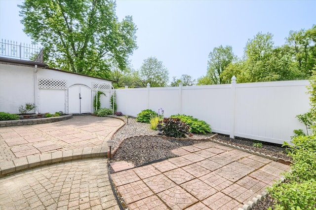 5379 N Irish Rd, Davison, MI 48423 - fenced backyard featuring a patio