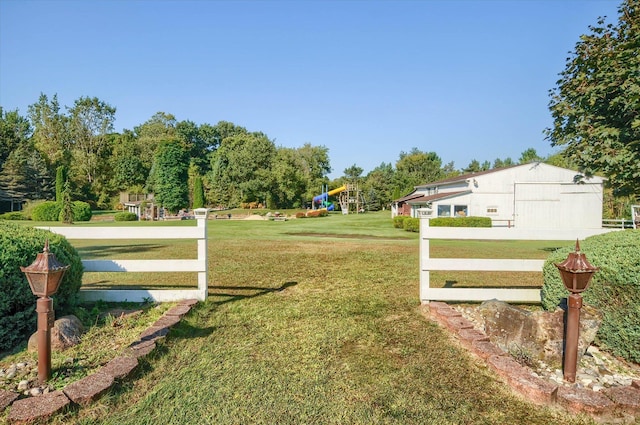 5379 N Irish Rd, Davison, MI 48423 - view of grassy yard with a playground