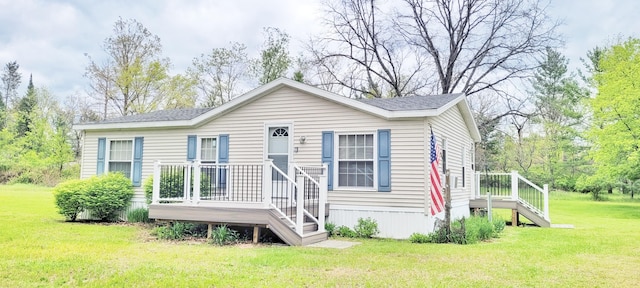 8326 S Delaware Ave, Baldwin, MI 49304 - manufactured / mobile home with a front lawn