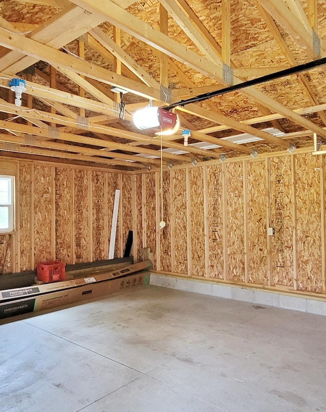 8326 S Delaware Ave, Baldwin, MI 49304 - garage featuring a garage door opener
