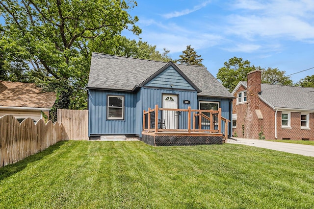 123 Oneida St SW, Wyoming, MI 49548 - bungalow-style home featuring board and batten siding, roof with shingles, and a deck