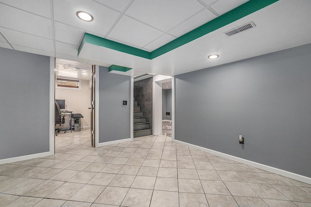 123 Oneida St SW, Wyoming, MI 49548 - unfurnished room with light tile patterned flooring, stairs, baseboards, and recessed lighting