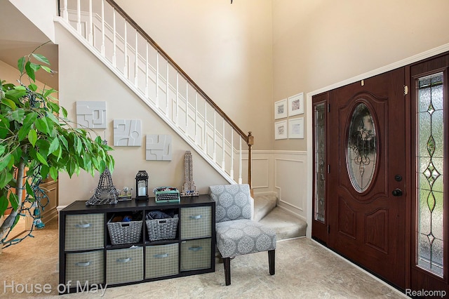 47951 Picadilly Ct, Canton, MI 48187 - entrance foyer featuring stairway, a high ceiling, and a decorative wall