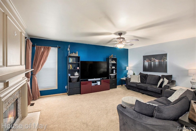 47951 Picadilly Ct, Canton, MI 48187 - living room with light colored carpet, a ceiling fan, and a high end fireplace
