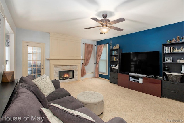 47951 Picadilly Ct, Canton, MI 48187 - living area featuring light carpet, ceiling fan, and a fireplace with flush hearth
