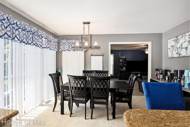47951 Picadilly Ct, Canton, MI 48187 - dining area featuring a ceiling fan and a chandelier