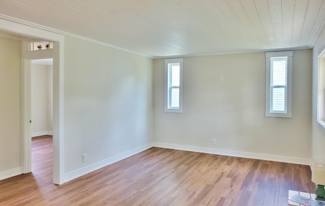 121 S Marshall St, New Buffalo, MI 49117 - unfurnished room with ornamental molding, light wood-style floors, baseboards, and wooden ceiling