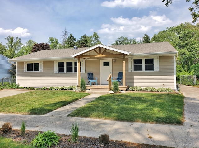121 S Marshall St, New Buffalo, MI 49117 - view of front of home featuring covered porch and roof with shingles