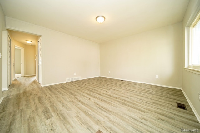 16282 Evergreen Ave, Eastpointe, MI 48021 - unfurnished room featuring light wood-style flooring and baseboards