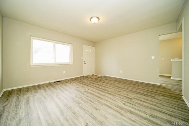 16282 Evergreen Ave, Eastpointe, MI 48021 - empty room featuring wood finished floors and baseboards