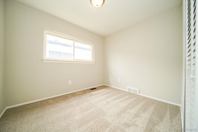 16282 Evergreen Ave, Eastpointe, MI 48021 - carpeted empty room featuring baseboards