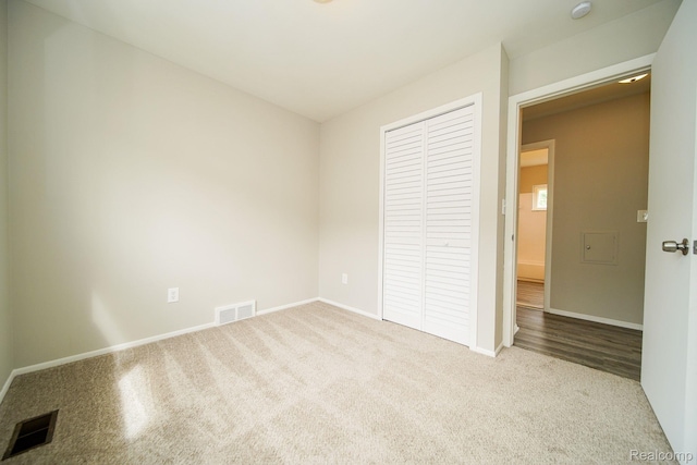 16282 Evergreen Ave, Eastpointe, MI 48021 - unfurnished bedroom with carpet flooring, a closet, and baseboards