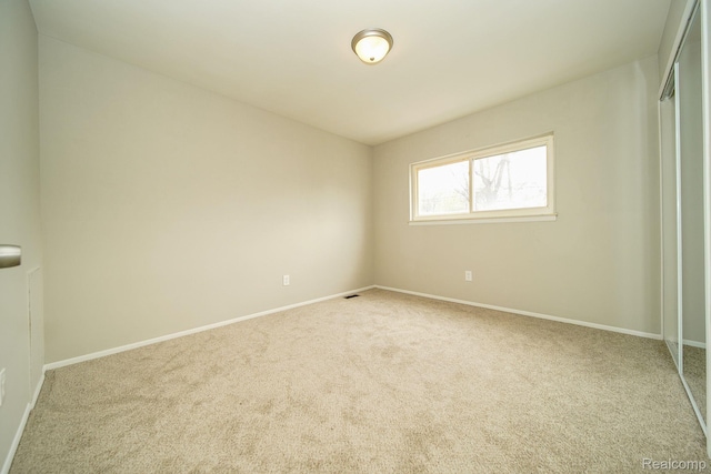 16282 Evergreen Ave, Eastpointe, MI 48021 - empty room featuring carpet flooring and baseboards
