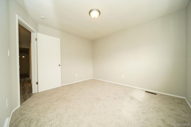 16282 Evergreen Ave, Eastpointe, MI 48021 - carpeted spare room with baseboards and a smoke detector