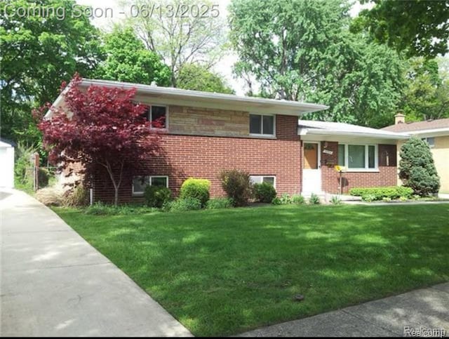 32702 Winona St, Westland, MI 48185 - view of front facade featuring a front lawn and brick siding