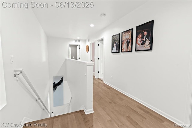 3278 Tyler Ave, Berkley, MI 48072 - hallway with an upstairs landing, light wood-style flooring, and recessed lighting
