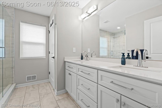 3278 Tyler Ave, Berkley, MI 48072 - bathroom featuring double vanity, a stall shower, and marble look tile flooring