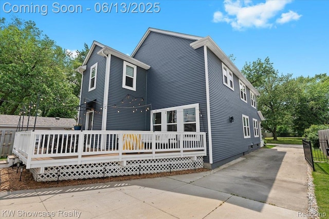 3278 Tyler Ave, Berkley, MI 48072 - back of house featuring a wooden deck and driveway
