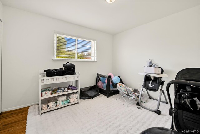 37288 Vernon Dr, Sterling Heights, MI 48310 - game room featuring wood finished floors and baseboards