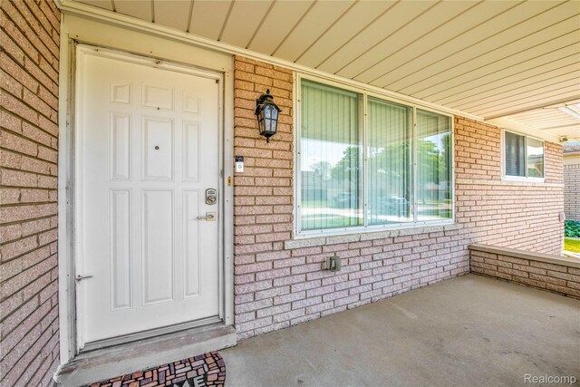 37288 Vernon Dr, Sterling Heights, MI 48310 - entrance to property with brick siding and covered porch