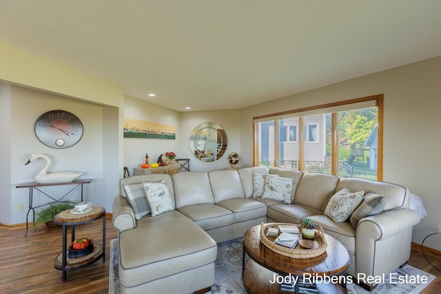 226 Sunset Ave NW, Grand Rapids, MI 49504 - living room with wood finished floors, baseboards, and recessed lighting