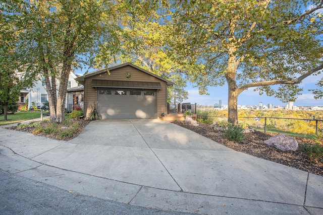 226 Sunset Ave NW, Grand Rapids, MI 49504 - view of front facade featuring driveway and an attached garage