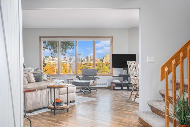 226 Sunset Ave NW, Grand Rapids, MI 49504 - living room featuring stairs and wood finished floors