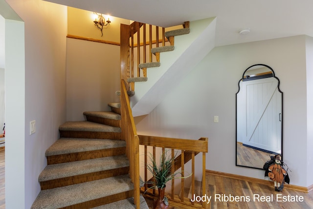 226 Sunset Ave NW, Grand Rapids, MI 49504 - staircase with wood finished floors and baseboards