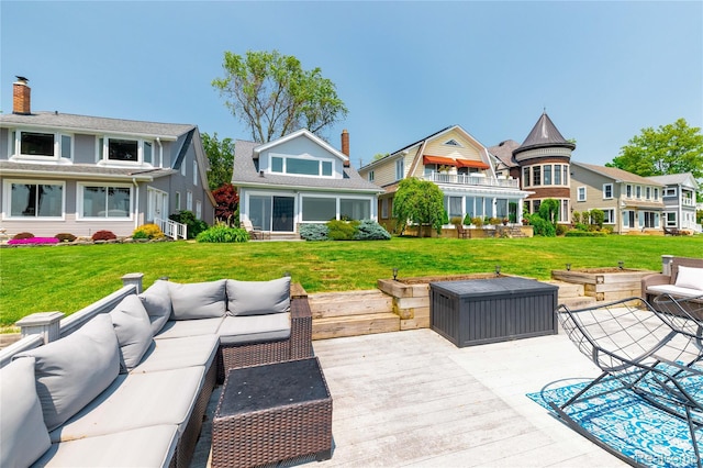 29899 E River Rd, Grosse Ile, MI 48138 - back of house featuring outdoor lounge area, a chimney, a yard, and a deck