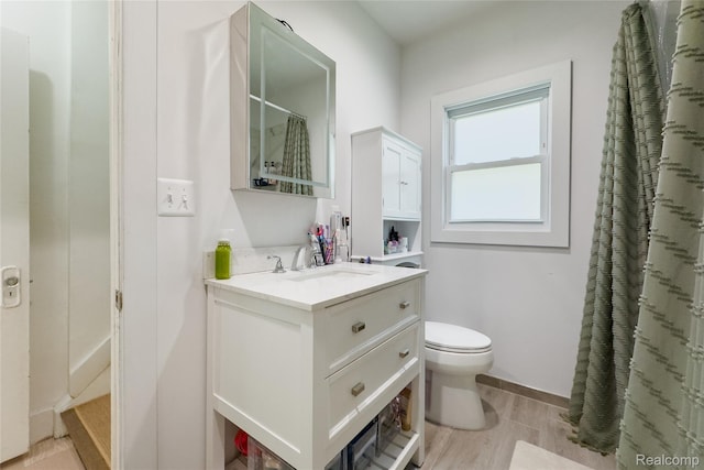 29899 E River Rd, Grosse Ile, MI 48138 - bathroom with toilet, vanity, and a shower with curtain