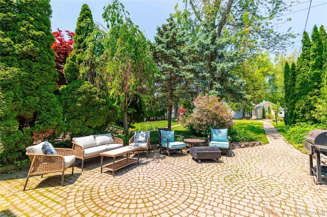 29899 E River Rd, Grosse Ile, MI 48138 - view of patio / terrace with an outdoor hangout area, an outdoor structure, and a grill