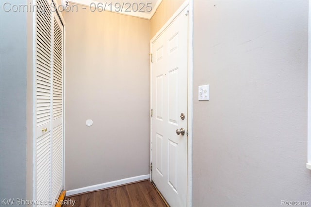 30731 Middlebury St, Westland, MI 48186 - doorway featuring dark wood finished floors and baseboards