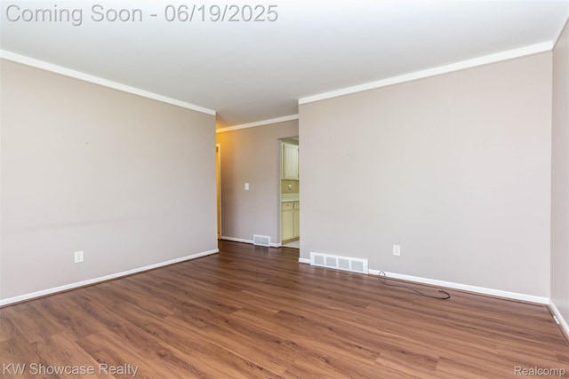 30731 Middlebury St, Westland, MI 48186 - unfurnished room with wood finished floors and ornamental molding