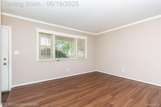 30731 Middlebury St, Westland, MI 48186 - empty room featuring wood finished floors and ornamental molding