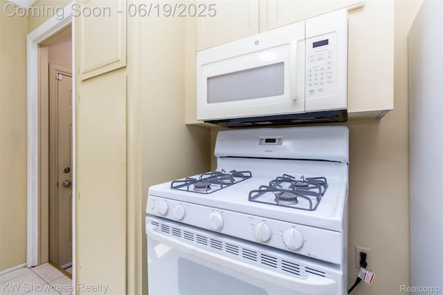 30731 Middlebury St, Westland, MI 48186 - kitchen with white appliances and light tile patterned flooring