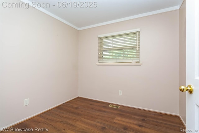 30731 Middlebury St, Westland, MI 48186 - unfurnished room featuring dark wood-type flooring and crown molding
