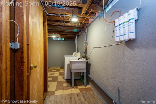 30731 Middlebury St, Westland, MI 48186 - basement with washing machine and clothes dryer and tile patterned floors