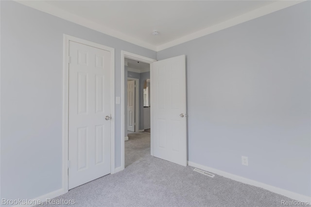 23123 Lambrecht Ave, Eastpointe, MI 48021 - unfurnished bedroom with carpet floors and baseboards